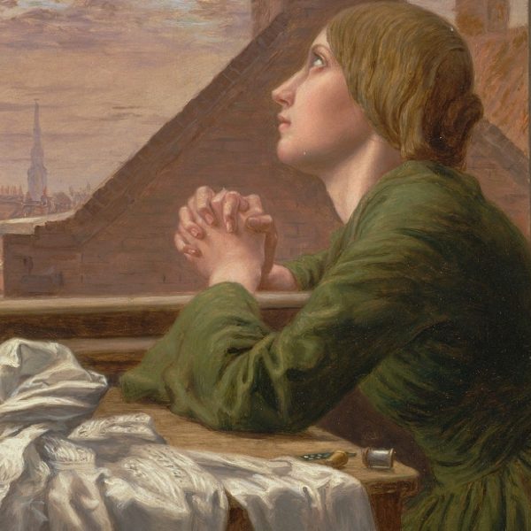 A painting of a Victorian woman in green dress looking up to heaven with her hands clasped together. She sits at a table by the window and on the table is a half made shirt.