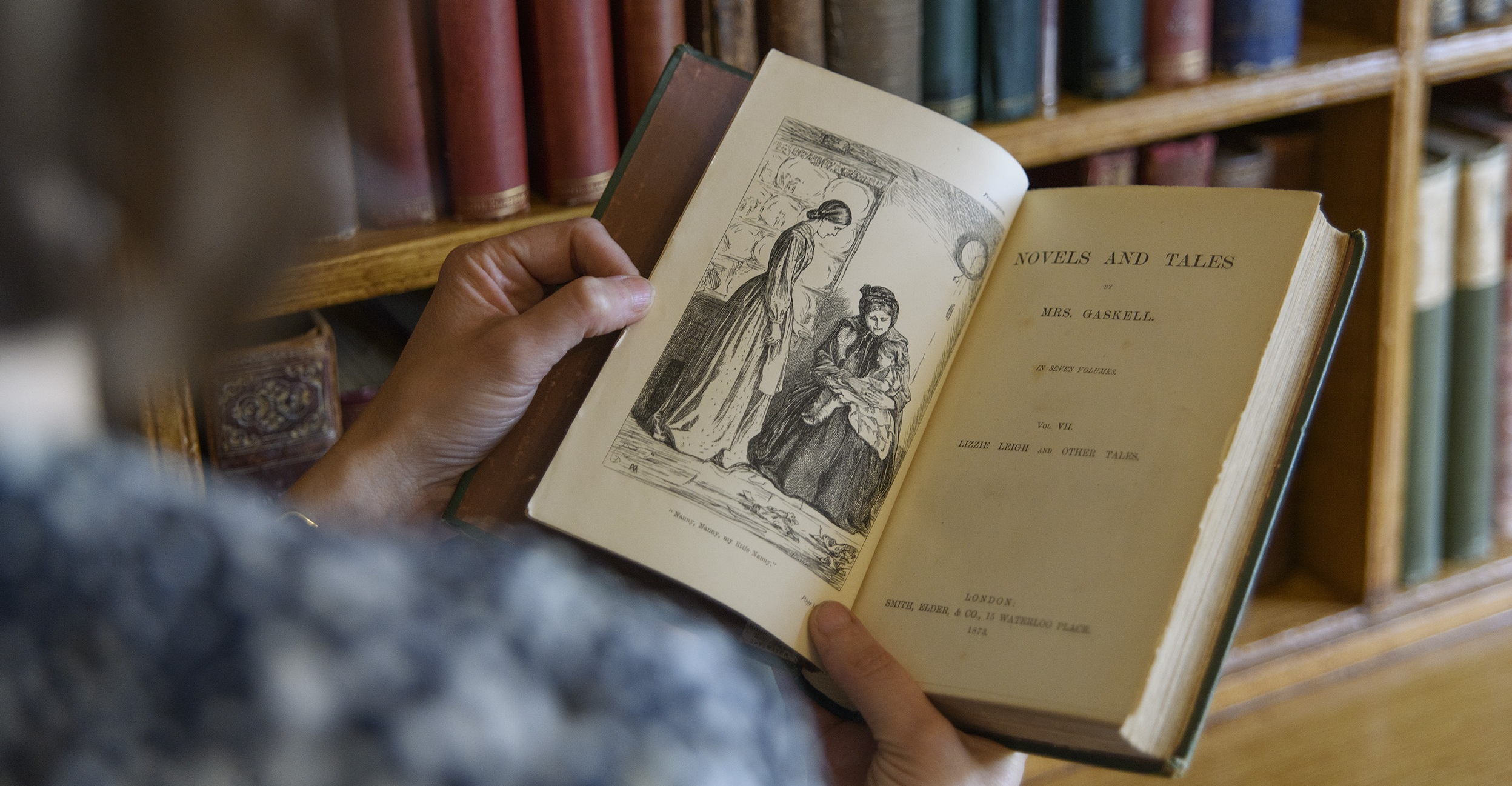 A person reading a Victorian novel.